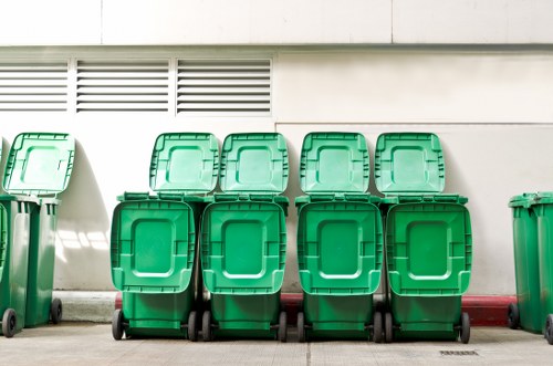 Residential waste bins ready for collection in Ickenham